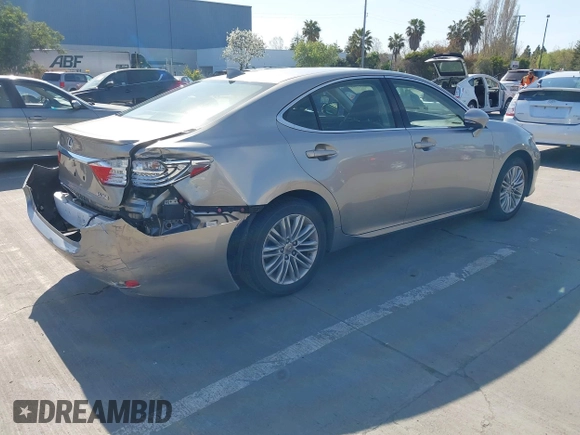 2015 Lexus ES with VIN JTHBK1GG3F2196961, listed as a IAAI auction lot 42003591 with 82,580 mi miles. Bid and sale history available at carsss.com. Image 4.