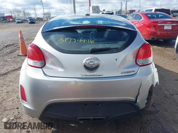 2017 Hyundai Veloster with VIN KMHTC6AD6HU310694, listed as a IAAI auction lot 41734446 with 99,432 mi miles. Bid and sale history available at carsss.com. Image 16.