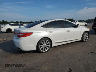 2013 Hyundai Azera с VIN KMHFH4JG4DA330015, выставлен на аукционе Copart как лот 62757555 с пробегом 128 339 миль миль и Чистый • Clean title. История ставок и продаж доступна на DreamBid. Изображение 3.