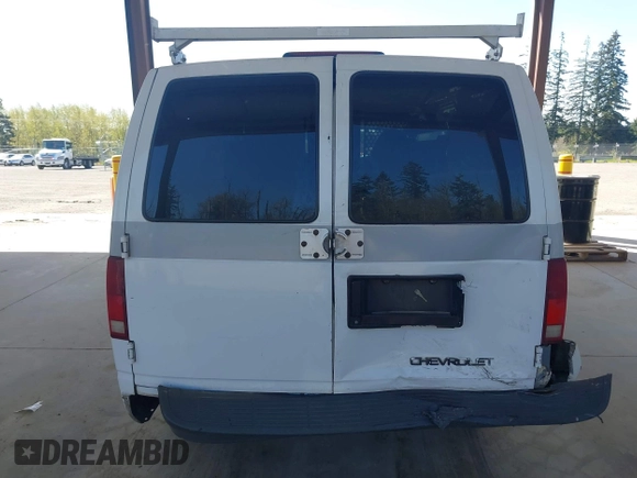 1997 Chevrolet Astro Cargo Van with VIN 1GCDM19W3VB162090, listed as a IAAI auction lot 42019388 with 238,724 mi miles. Bid and sale history available at carsss.com. Image 16.