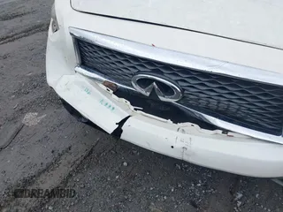 2014 Infiniti QX70 z VIN JN8CS1MU7EM451246, wystawiony jako IAAI lot #42221306 z przebiegiem 190 252 mil mil oraz . Historia ofert i sprzedaży dostępna na DreamBid. Obrazek 6.