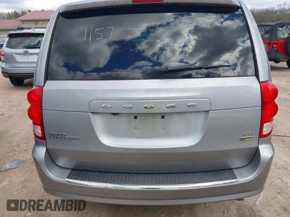 2017 Dodge Grand Caravan SXT with VIN 2C4RDGCG6HR671199, listed as a IAAI auction lot 42031157 with 99,189 mi miles and . Bid and sale history available at DreamBid. Image 16.