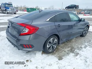 2017 Honda Civic EX-T with VIN 19XFC1E38HE031851, listed as a IAAI auction lot 41625294 with 97,432 mi miles and . Bid and sale history available at DreamBid. Image 4.