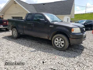 2006 Ford F-150 STX with VIN 1FTRX14W36NB54625, listed as a Copart auction lot 58221215 with 219,195 mi miles and Salvage title. Bid and sale history available at DreamBid. Image 4.