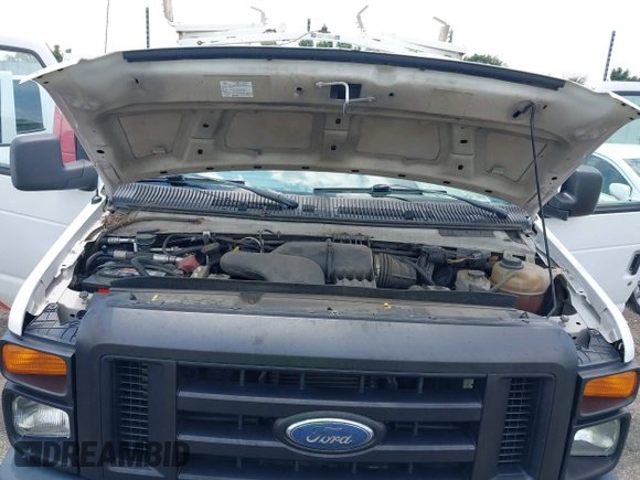 2010 Ford Econoline Cargo Commercial with VIN 1FTNE2EL7ADA74595, listed as a IAAI auction lot 42512878 with 154,412 mi miles and . Bid and sale history available at DreamBid. Image 10.