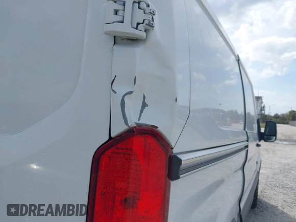 2015 Ford Transit Cargo with VIN 1FTNE1YM0FKA36529, listed as a IAAI auction lot 41731422 with 229,660 mi miles and . Bid and sale history available at DreamBid. Image 18.