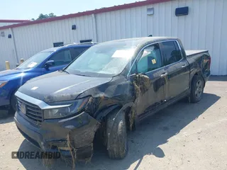 2022 Honda Ridgeline RTL-E with VIN 5FPYK3F75NB020232, listed as a IAAI auction lot 42549034 with 40,209 mi miles and . Bid and sale history available at DreamBid. Image 6.