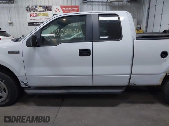 2007 Ford F-150 XLT with VIN 1FTPX14V67FA70678, listed as a IAAI auction lot 41820241 with 222,056 mi miles. Bid and sale history available at carsss.com. Image 14.