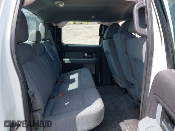 2014 Ford F-150 XL with VIN 1FTFW1EF0EKG24050, listed as a IAAI auction lot 42074584 with 129,448 mi miles and . Bid and sale history available at DreamBid. Image 8.