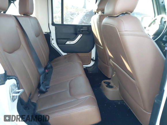 2017 Jeep Wrangler Unlimited Sahara with VIN 1C4BJWEG0HL587163, listed as a IAAI auction lot 41252399 with 84,983 mi miles. Bid and sale history available at carsss.com. Image 8.