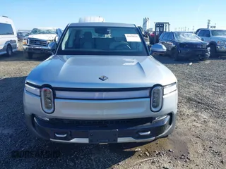 2023 Rivian R1T Adventure with VIN 7FCTGAAA0PN021864, listed as a IAAI auction lot 41620630 with 1 mi miles. Bid and sale history available at carsss.com. Image 12.