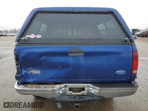 1997 Ford F-150 XL with VIN 1FTDX18W3VKC25911, listed as a Copart auction lot 44074305 with 184,409 mi miles and Salvage Title. Bid and sale history available at carsss.com. Image 6.