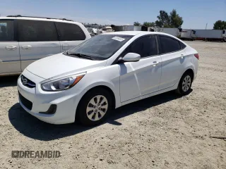 2015 Hyundai Accent GLS with VIN KMHCT4AE6FU863517, listed as a Copart auction lot 60656053 with 121,353 mi miles. Bid and sale history available at carsss.com. Image 1.
