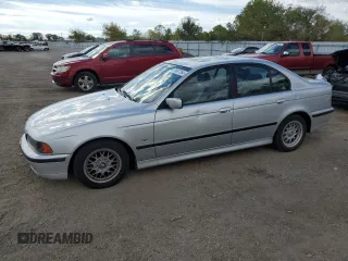 2000 BMW 5 Series 528iA with VIN WBADM6346YGU10549, listed as a Copart auction lot 75047164 with 324,945 mi miles and Salvage Title. Bid and sale history available at carsss.com. Image 1.