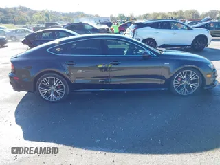 2016 Audi A7 Prestige z VIN WAU2GAFC5GN169534, wystawiony jako IAAI lot #40802384 z przebiegiem 103 263 mil mil oraz . Historia ofert i sprzedaży dostępna na DreamBid. Obrazek 13.