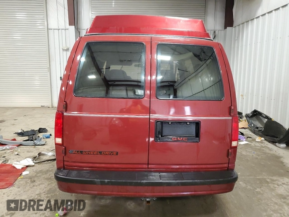 1992 GMC Safari z VIN 1GDEL19W2NB539396, wystawiony jako Copart lot #79221434 z przebiegiem 99 406 mil mil oraz Nie do naprawy • Non repairable. Historia ofert i sprzedaży dostępna na DreamBid. Obrazek 6.
