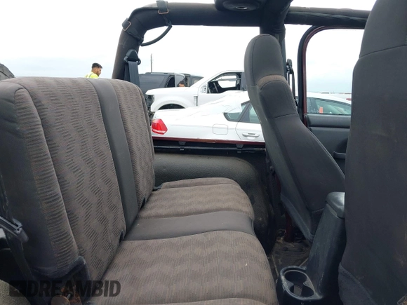 2003 Jeep Wrangler Sport with VIN 1J4FA49S63P324904, listed as a IAAI auction lot 42138001 with 170,917 mi miles and . Bid and sale history available at DreamBid. Image 8.