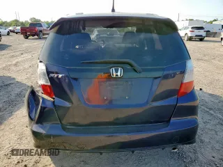 2009 Honda Fit Sport z VIN JHMGE88479S009638, wystawiony jako Copart lot #59407455 z przebiegiem Nie podano mil oraz Szkoda całkowita • Salvage title. Historia ofert i sprzedaży dostępna na DreamBid. Obrazek 6.