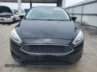 2016 Ford Focus SE z VIN 1FADP3F21GL262289, wystawiony jako Copart lot #60318515 z przebiegiem 79 529 mil mil oraz Szkoda całkowita • Salvage title. Historia ofert i sprzedaży dostępna na DreamBid. Obrazek 5.