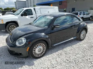 2014 Volkswagen Beetle 2.5L z VIN 3VWJP7ATXEM602732, wystawiony jako Copart lot #61470995 z przebiegiem 222 660 mil mil oraz Czysty tytuł • Clean title. Historia ofert i sprzedaży dostępna na DreamBid. Obrazek 1.