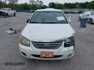 2009 Kia Spectra EX z VIN KNAFE221795589378, wystawiony jako IAAI lot #42202737 z przebiegiem 181 424 mil mil oraz . Historia ofert i sprzedaży dostępna na DreamBid. Obrazek 13.