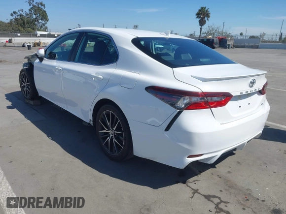 2023 Toyota Camry SE with VIN 4T1G11AK9PU751579, listed as a IAAI auction lot 42014251 with 35,748 mi miles. Bid and sale history available at carsss.com. Image 3.