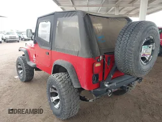 1994 Jeep Wrangler with VIN 1J4FY29S1RP437913, listed as a IAAI auction lot 42185965 with 245,618 mi miles and . Bid and sale history available at DreamBid. Image 3.