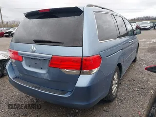 2010 Honda Odyssey EX-L with VIN 5FNRL3H64AB015029, listed as a IAAI auction lot 41962577 with 173,170 mi miles. Bid and sale history available at carsss.com. Image 4.