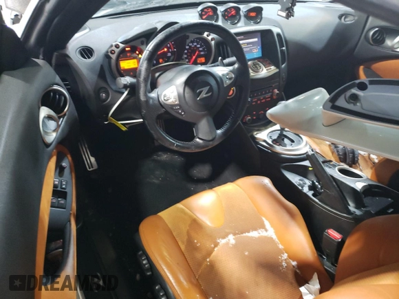 2012 Nissan 370Z z VIN JN1AZ4EH2CM564443, wystawiony jako Copart lot #45126885 z przebiegiem 71 729 mil mil oraz Szkody całkowita. Historia ofert i sprzedaży dostępna na DreamBid. Obrazek 8.