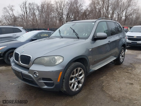 2011 BMW X5 35i with VIN 5UXZV4C52BL407776, listed as a IAAI auction lot 41538832 with 108,546 mi miles. Bid and sale history available at carsss.com. Image 22.