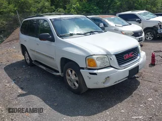2003 GMC Envoy SLT with VIN 1GKDS13S632266506, listed as a IAAI auction lot 42149049 with 259,884 mi miles. Bid and sale history available at carsss.com. Image 1.