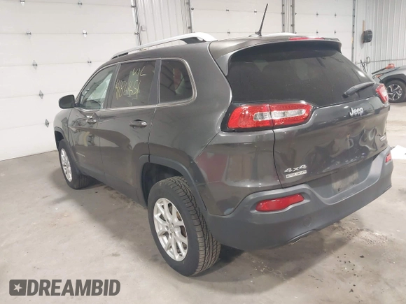 2014 Jeep Cherokee Altitude with VIN 1C4PJMCB2EW317346, listed as a IAAI auction lot 41861651 with 100,602 mi miles. Bid and sale history available at carsss.com. Image 3.