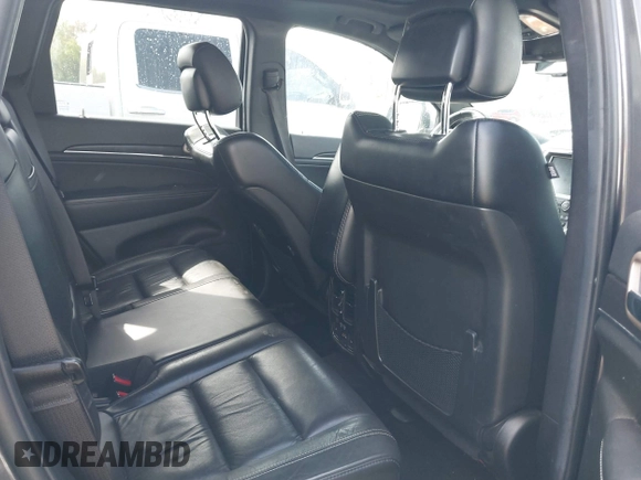 2014 Jeep Grand Cherokee Limited with VIN 1C4RJFBT4EC349957, listed as a IAAI auction lot 42118241 with 127,168 mi miles and . Bid and sale history available at DreamBid. Image 8.