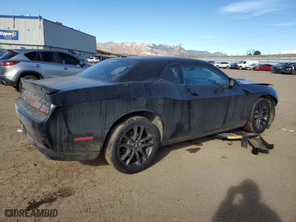 2021 Dodge Challenger GT with VIN 2C3CDZKG3MH677579, listed as a Copart auction lot 41977525 with 65,597 mi miles and Salvage Title. Bid and sale history available at carsss.com. Image 3.