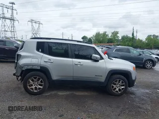2015 Jeep Renegade Latitude z VIN ZACCJBBT2FPC28341, wystawiony jako IAAI lot #42286301 z przebiegiem 120 676 mil mil oraz . Historia ofert i sprzedaży dostępna na DreamBid. Obrazek 13.