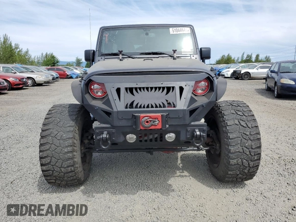 2016 Jeep Wrangler Unlimited Freedom with VIN 1C4BJWDG8GL300314, listed as a Copart auction lot 61044645 with 103,396 mi miles and Clean title. Bid and sale history available at DreamBid. Image 5.