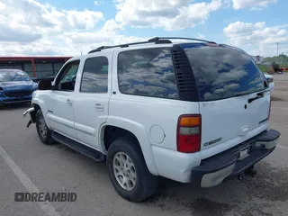 2002 Chevrolet Tahoe Z71 z VIN 1GNEK13Z32R326011, wystawiony jako IAAI lot #42181335 z przebiegiem 315 321 mil mil oraz . Historia ofert i sprzedaży dostępna na DreamBid. Obrazek 14.
