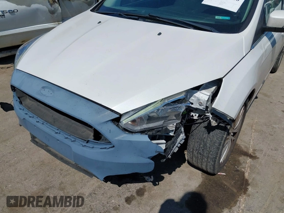 2018 Ford Focus Titanium with VIN 1FADP3N24JL279449, listed as a IAAI auction lot 42297780 with 144,479 mi miles and . Bid and sale history available at DreamBid. Image 6.