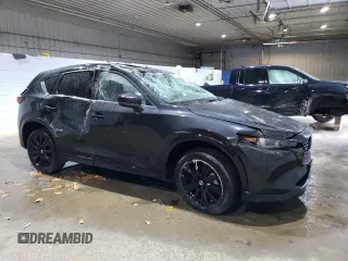 2022 Mazda CX-5 2.5 Turbo with VIN JM3KFBAY8N0648384, listed as a Copart auction lot 79225814 with 21,313 mi miles and Salvage Title. Bid and sale history available at carsss.com. Image 4.