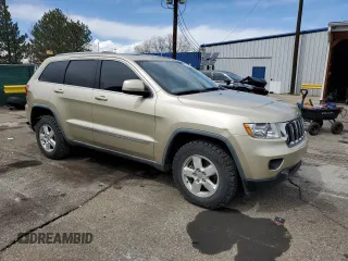 2011 Jeep Grand Cherokee Laredo with VIN 1J4RR4GG3BC641016, listed as a Copart auction lot 51538085 with 62,912 mi miles and Salvage Title. Bid and sale history available at carsss.com. Image 4.