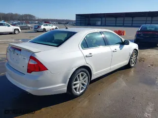 2011 Ford Fusion SEL with VIN 3FAHP0JA8BR255770, listed as a IAAI auction lot 41744199 with 146,889 mi miles. Bid and sale history available at carsss.com. Image 4.