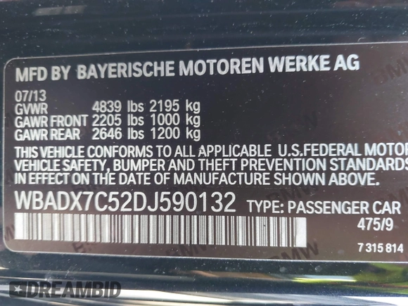 2013 BMW 3 Series 335i with VIN WBADX7C52DJ590132, listed as a IAAI auction lot 41486602 with 154,984 mi miles and . Bid and sale history available at DreamBid. Image 9.