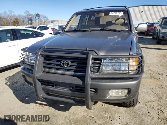 2002 Toyota Land Cruiser z VIN JTEHT05J122024015, wystawiony jako Copart lot #88706765 z przebiegiem Nie podano mil oraz Czysty tytuł • Clean title. Historia ofert i sprzedaży dostępna na DreamBid. Obrazek 5.