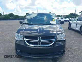 2019 Dodge Grand Caravan SXT with VIN 2C4RDGCG5KR797853, listed as a IAAI auction lot 40332854 with 81,197 mi miles and . Bid and sale history available at DreamBid. Image 6.