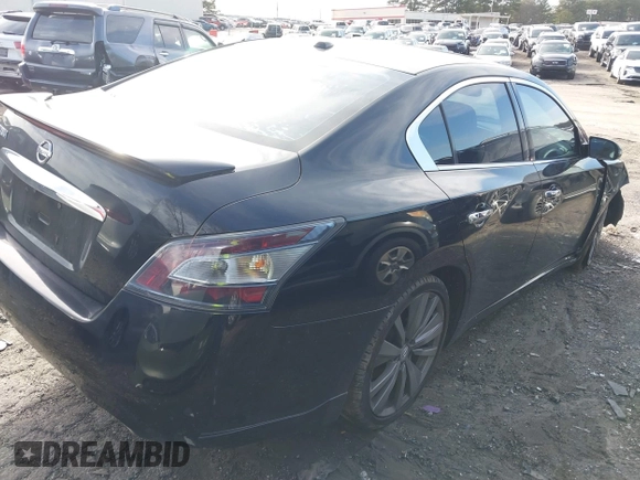 2014 Nissan Maxima S with VIN 1N4AA5AP0EC909054, listed as a IAAI auction lot 41581084 with 68,667 mi miles and . Bid and sale history available at DreamBid. Image 4.