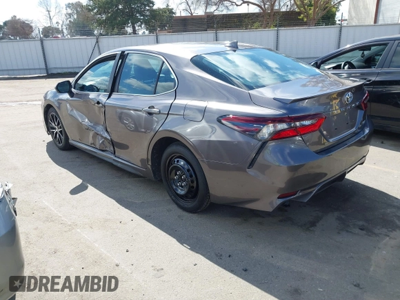 2022 Toyota Camry SE with VIN 4T1G11AK1NU499064, listed as a IAAI auction lot 41734310 with 87,159 mi miles and . Bid and sale history available at DreamBid. Image 3.