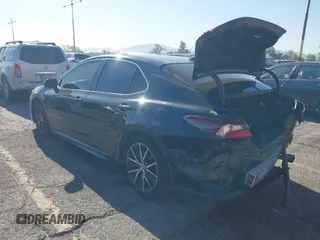 2021 Toyota Camry SE Nightshade with VIN 4T1T11AKXMU430841, listed as a IAAI auction lot 42019485 with 124,561 mi miles. Bid and sale history available at carsss.com. Image 3.