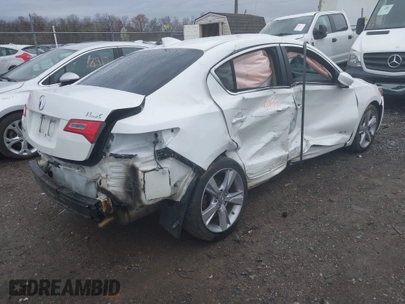 2014 Acura ILX Technology with VIN 19VDE1F75EE012228, listed as a IAAI auction lot 41958455 with 102,085 mi miles and . Bid and sale history available at DreamBid. Image 4.