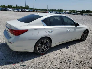 2015 Infiniti Q50 Premium with VIN JN1BV7AR9FM392349, listed as a Copart auction lot 59121255 with 104,199 mi miles and Salvage title. Bid and sale history available at DreamBid. Image 3.