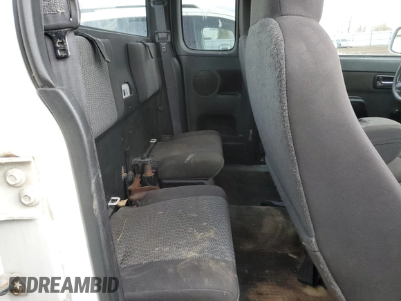 2012 GMC Canyon z VIN 1GTE5NFE9C8150251, wystawiony jako Copart lot #52897835 z przebiegiem 195 834 mil mil oraz Czysty tytuł • Clean title. Historia ofert i sprzedaży dostępna na DreamBid. Obrazek 10.